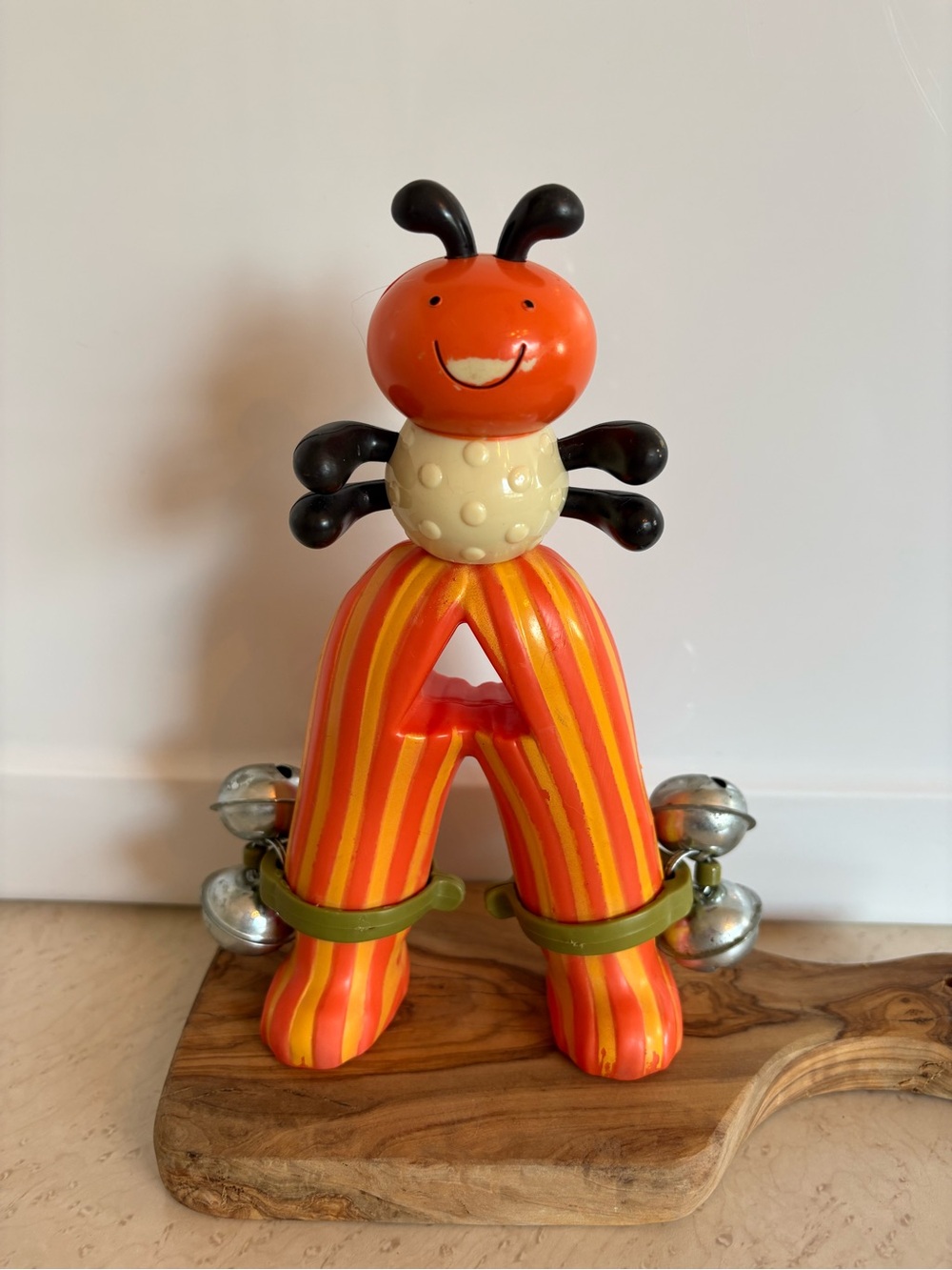 vintage Battat Bug Jingle Bell Rattle shaped like the letter "A"